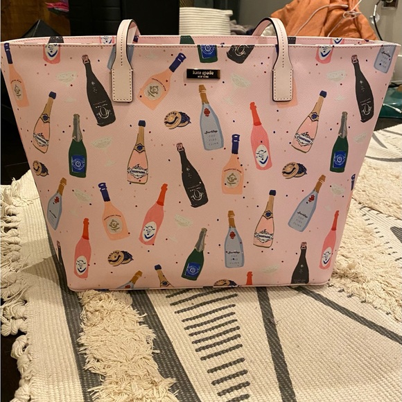 kate spade Handbags - NWT Kate Spade Champagne Hand Bag